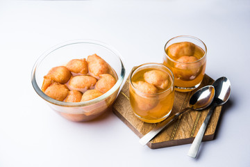 Kanji Vada / wada is a popular Rajasthani detoxifying dish consumed after over eating of sweets in Indian festival season. served in transparent Bowl or glass