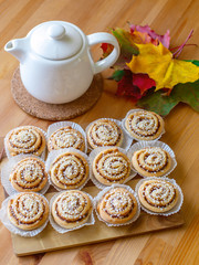 Sweet homemade cinnamon rolls with hot tasty tea