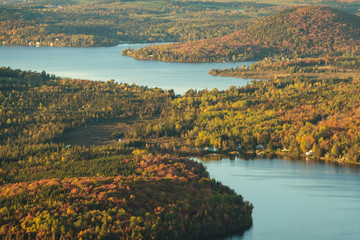 Fototapeta na wymiar Lakes and mountains in autumn view from the mountain, Adstock, Qc. Canada