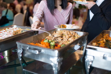 people group catering buffet food indoor, with food and beverage,Eat together.