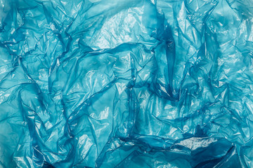 Background, Blue plastic bag closeup - obrazy, fototapety, plakaty