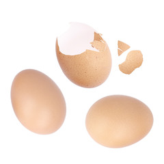 Broken eggs isolated on a white background.
