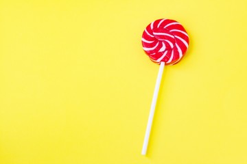 colorful lollipop on yellow