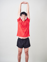 Young man sports player stretching and exercising