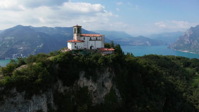 Aerial 4K - Lago D'Iseo (IT) - Monte Isola - vista della Chiesa della Madonna della Ceriola 