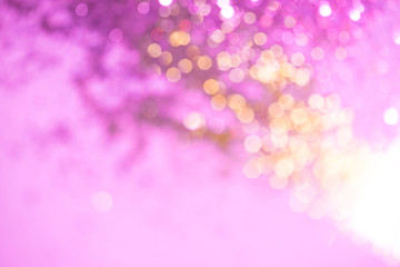 Pink purple bokeh abstract background.