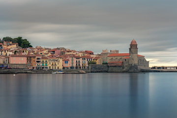 Coliure, France :  2019 Octobre 05 : Beautiful autumn day in the tourist city of Colliure in Occitania whit on back the church of Notre dames des Anges, France.
