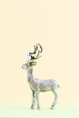 Christmas reindeer on pastel color background. Christmas or New Year minimal concept.