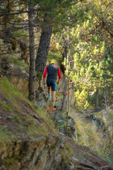  MAN TRAINS RUNNING THROUGH THE MOUNTAIN IN THE PYRENEES OF Andorra.