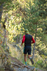  MAN TRAINS RUNNING THROUGH THE MOUNTAIN IN THE PYRENEES OF Andorra.