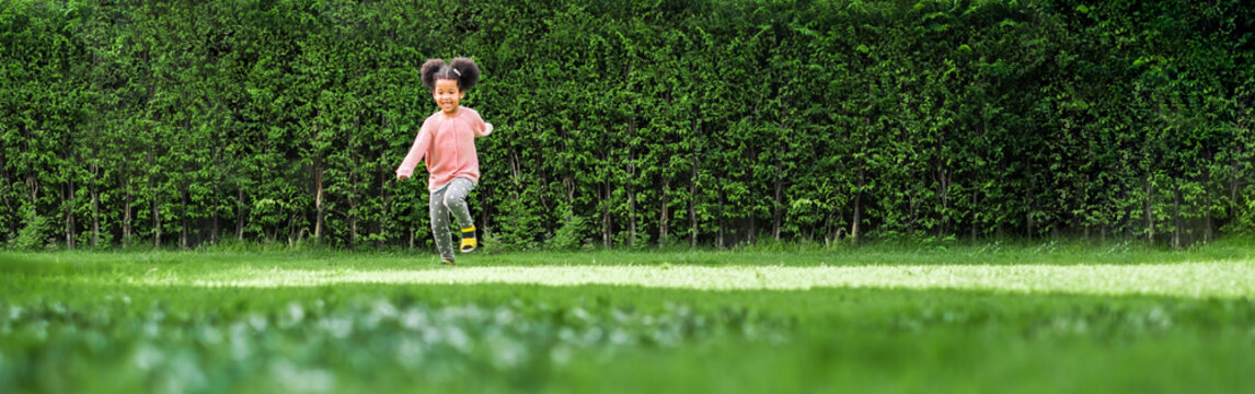 African Black Girl Kid Running On Backyard With Happy And Fun