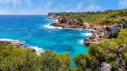 Panorama of beautiful beach and bay with turquoise sea water, Cala des Moro, Santanyi, Mallorca...