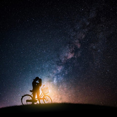 Couple love hug and kiss on night starry sky. Valentine's day and romantic design concept.