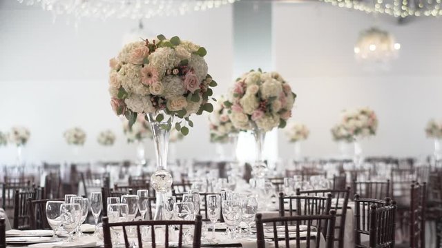 Wedding floral and dessert table arrangements