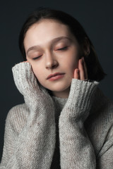 Portrait of girl with closed eyes. Close up