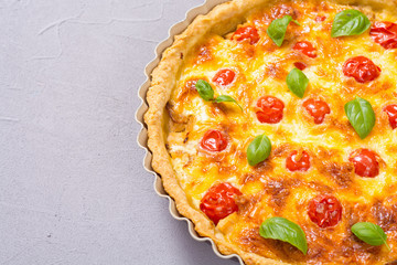 Chicken Quiche lorraine with mushrooms , tomatoes and cheese