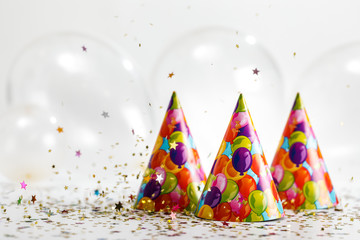 confetti and party hat. party background with copy space