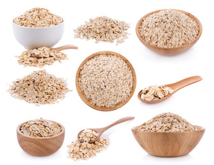 Oat flakes pile isolated on white background