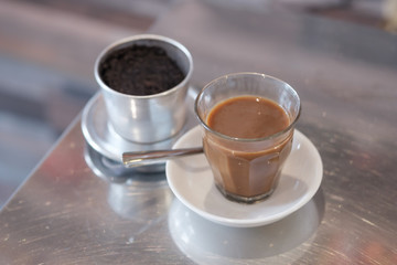 Hot milk coffee dripping in Vietnam style.