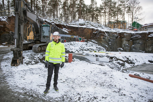 Construction worker on snow
