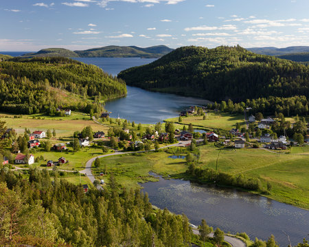 Town by forest and river in High Coast, Sweden