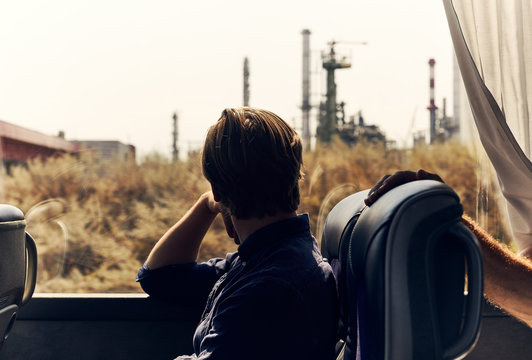 Man looking out of train window