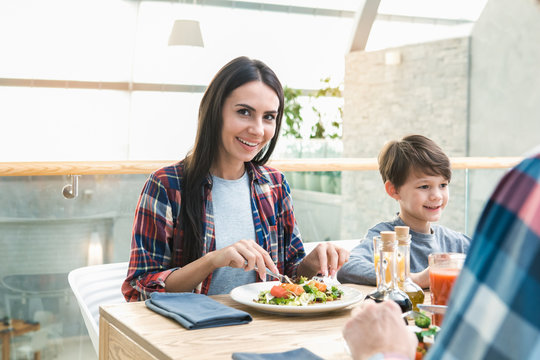 Family Sitting Together in the Restaurant Lunch Concept