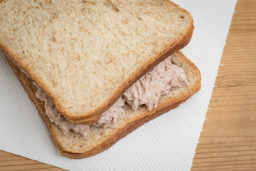 Tuna mayo sandwich with wheat bread.