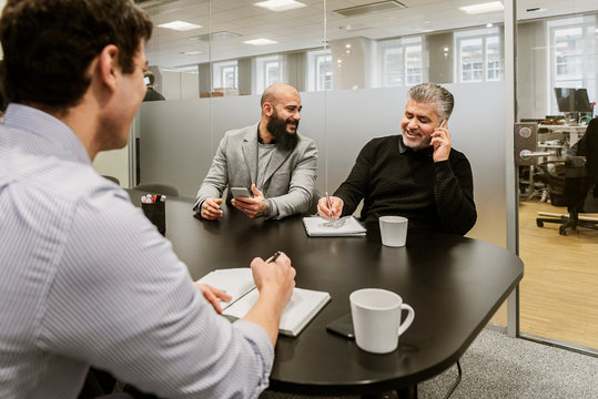 Men during business meeting