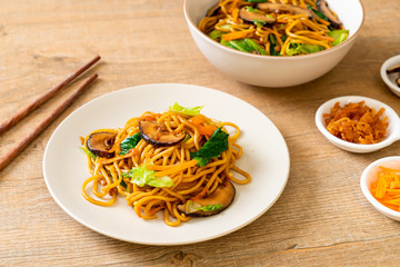 yakisoba noodles stir-fried with vegetable in asian style - vegan and vegetarian food