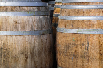 Fototapeta premium wine barrels close view, wooden texture background