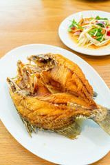 Fried snapper fish topped with fish sauce