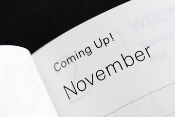 Obraz premium Coming Up! November, months of a year. Macro shot of a monthly planner.