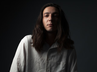 Portrait of a serious young man. Studio