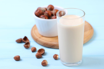 Hazelnut milk on the table. Vegetable milk, Vegetarian milk.