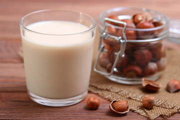 Hazelnut milk on the table. Vegetable milk, Vegetarian milk.