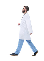 in full growth. qualified therapist confidently striding forward