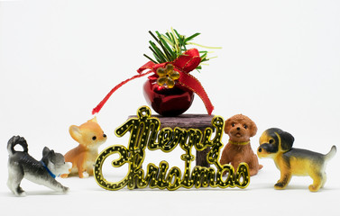 Dog doll stand and sit around the Merry christmas gold and black band and red bell on white background with clipping path