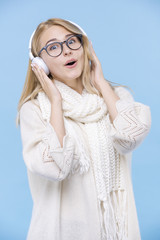 Portrait of woman listening to music