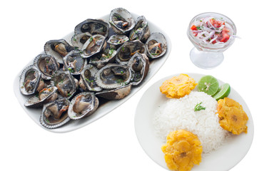 Seafood in white blank background. Baked oysters, clams, or mussels with sidedishes.  Tasty ecuadorian shellfish food.