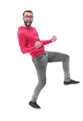 Fototapeta premium in full growth. portrait of a happy modern guy.