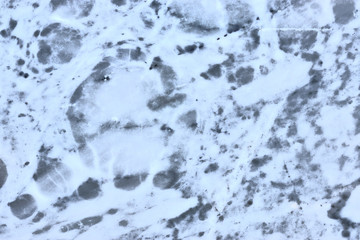 granite wall surface, facade, red-gray with black dots