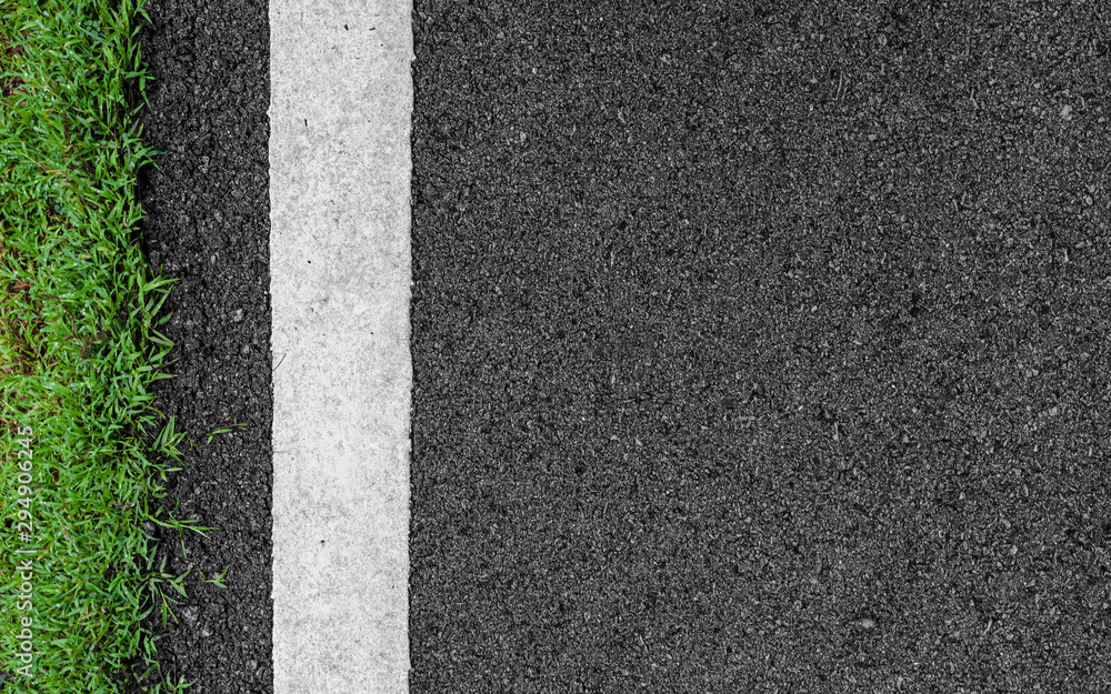 Wall mural surface grunge rough asphalt black dark grey road street and green grass texture background,empty co