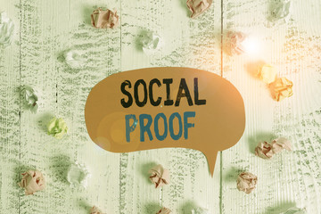 Conceptual hand writing showing Social Proof. Concept meaning informational social influence...