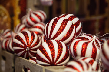 group of striped Christmas balls exhibited for sale