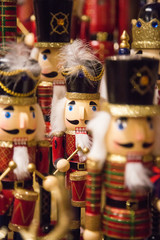 group of wooden Christmas soldiers nutcrackers with drum and hat
