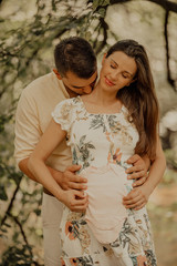 Romantic moments for pregnant couple