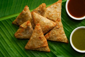 Homemade Samosas wiith Chutneys/Diwali snacks, selective focus