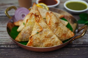 Homemade Malabar Onion samosa /Diwali festival snacks with coriander and tamarind chutneys