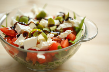 Glass bowl with Greek salad